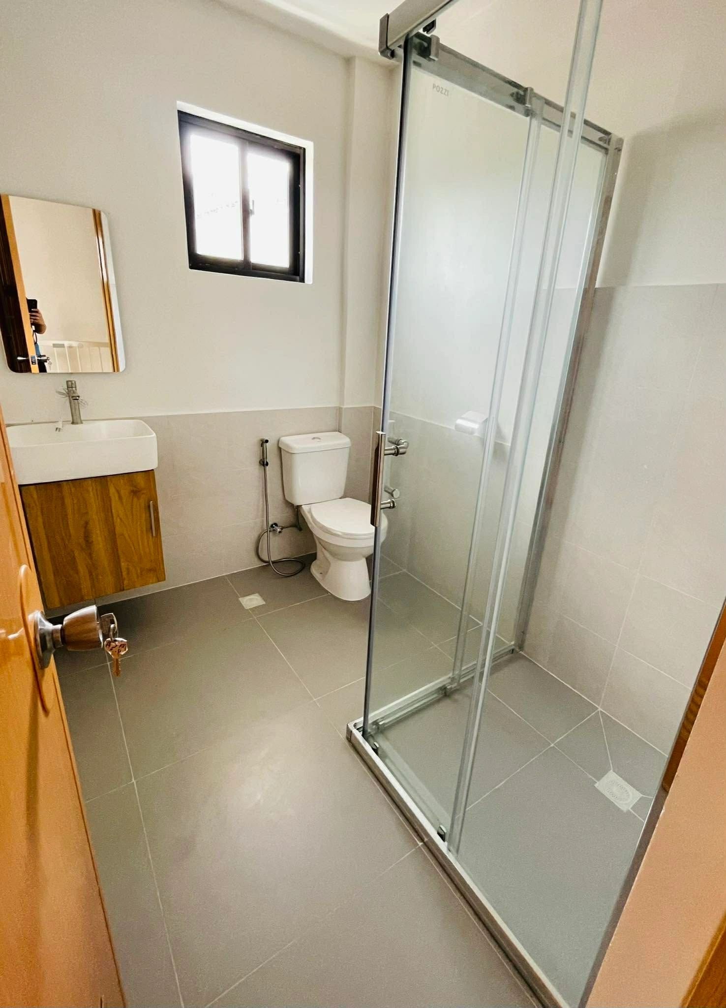 Bathroom with glass shower enclosure