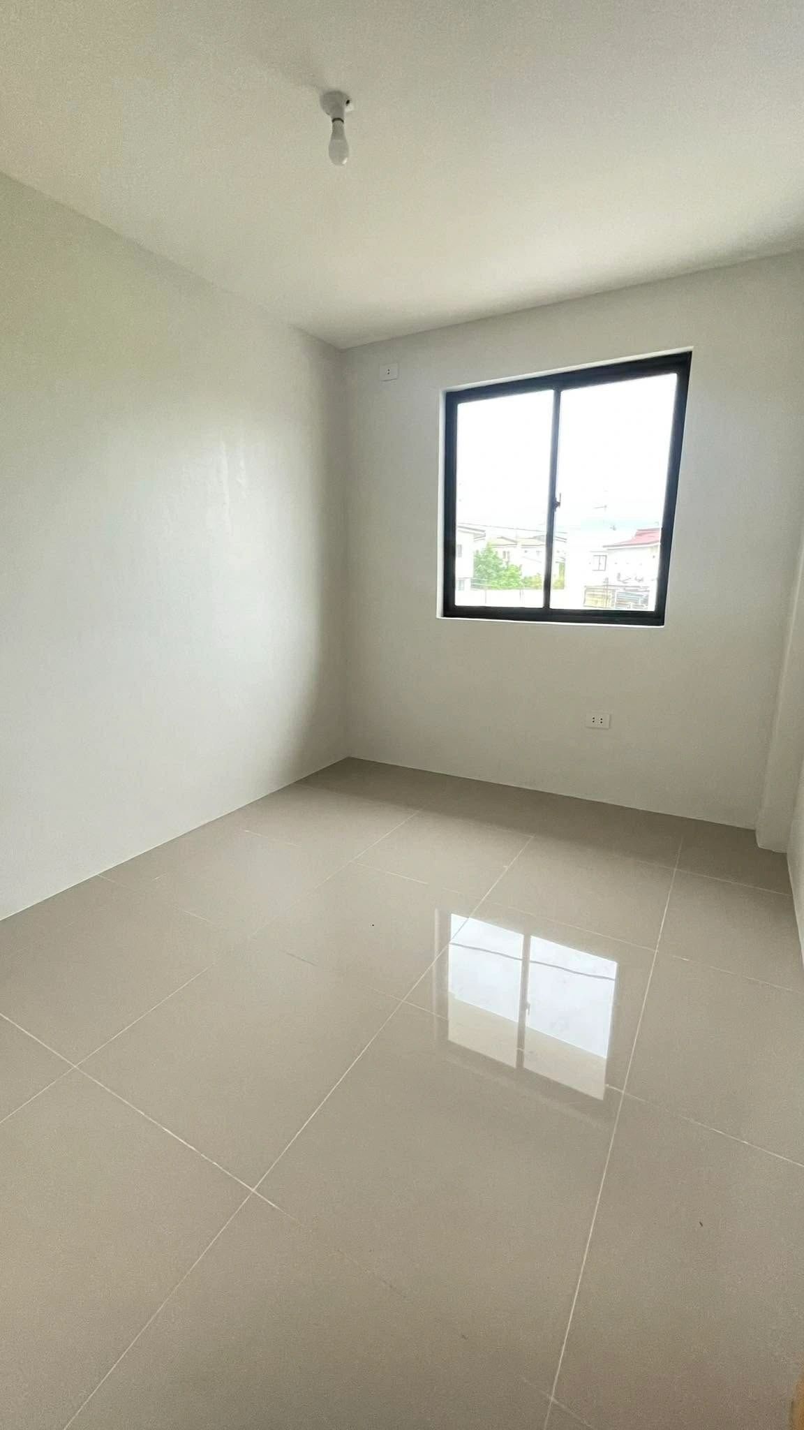Bright bedroom with tiled floor